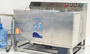 Máy tráng và rửa bình.